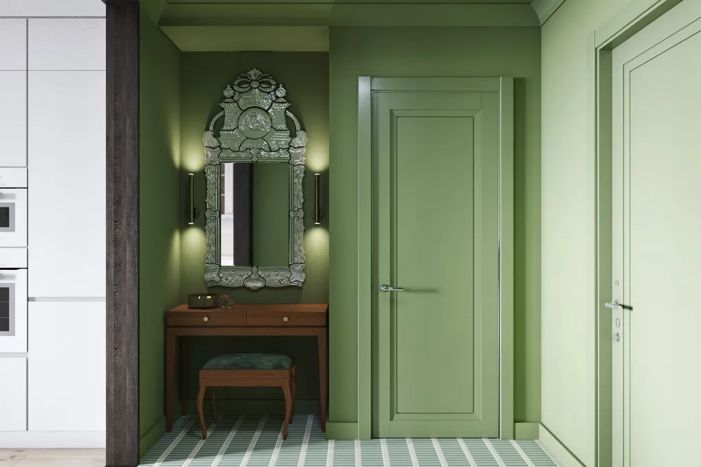 Narrow sage-green hallway with a vintage mirror and vanity, opened up by a striped floor and ceiling light