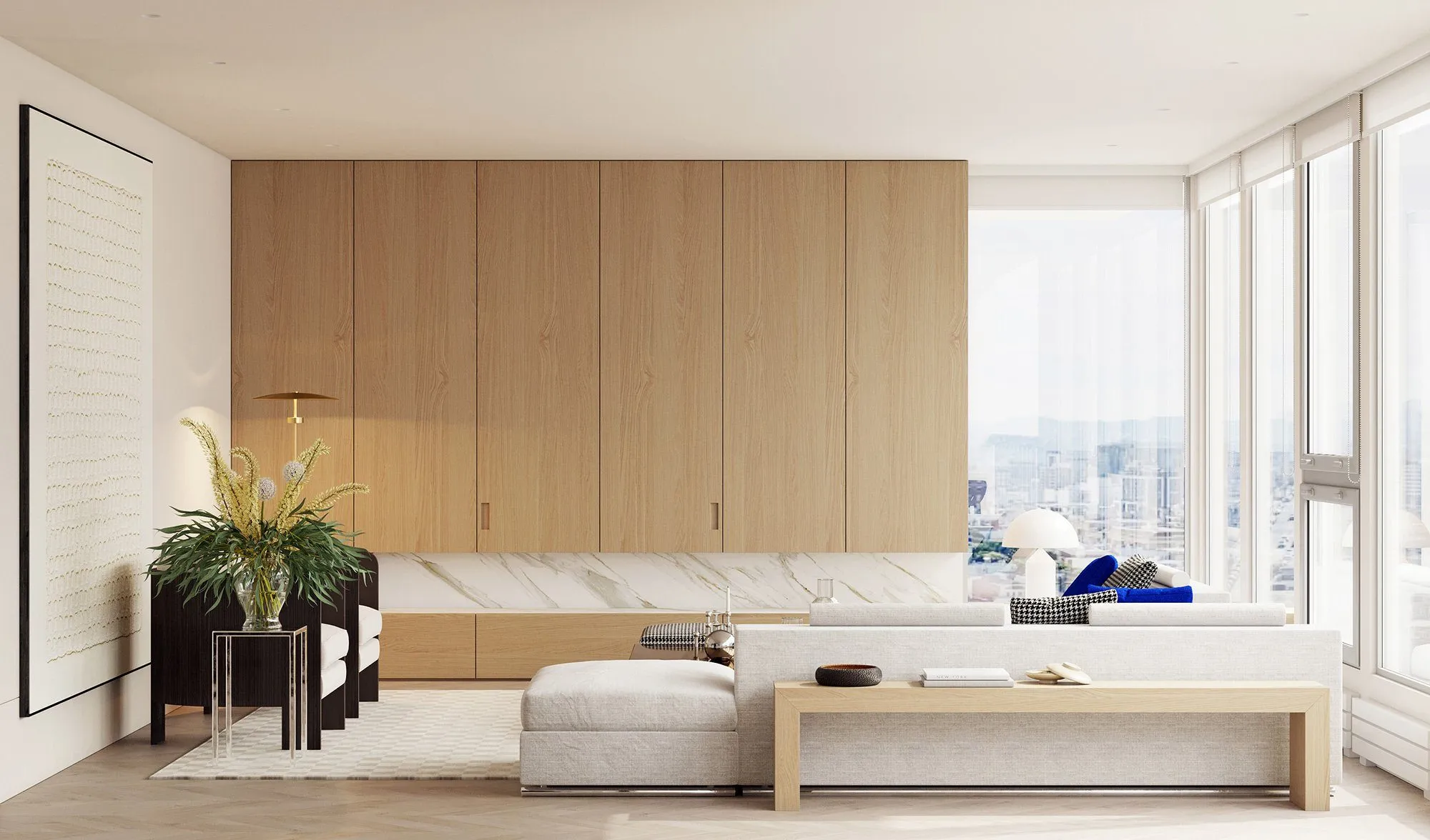 Living room with a full wall of pale oak cabinetry over a marble ledge, linen daybed and oak bench facing the city windows — Minimalist Glamour - condo