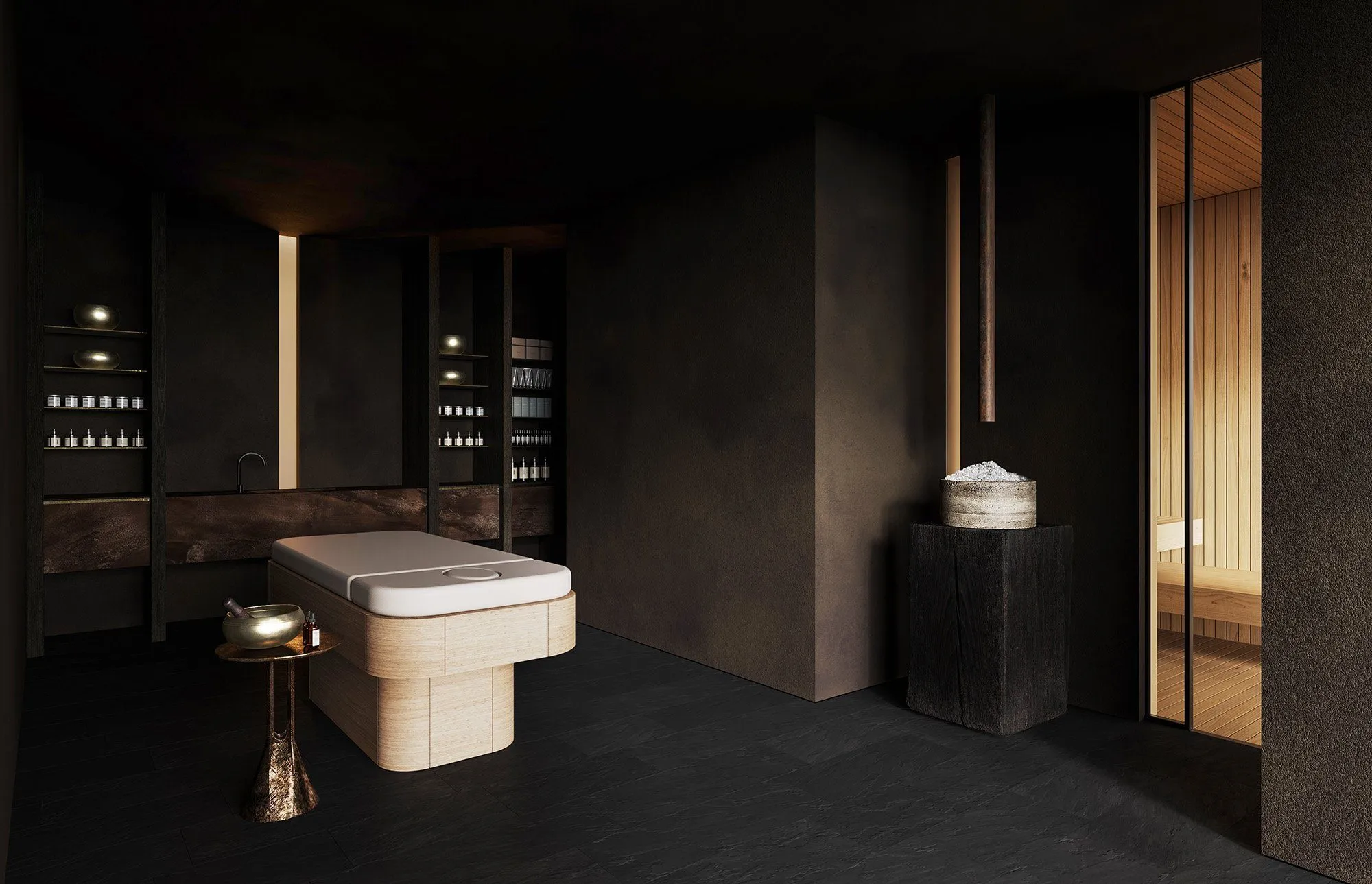 Treatment room with a pale wood massage table, hammered-bronze side table and dark shelves of candles and oils beside the sauna door — Obsidian Oasis Spa