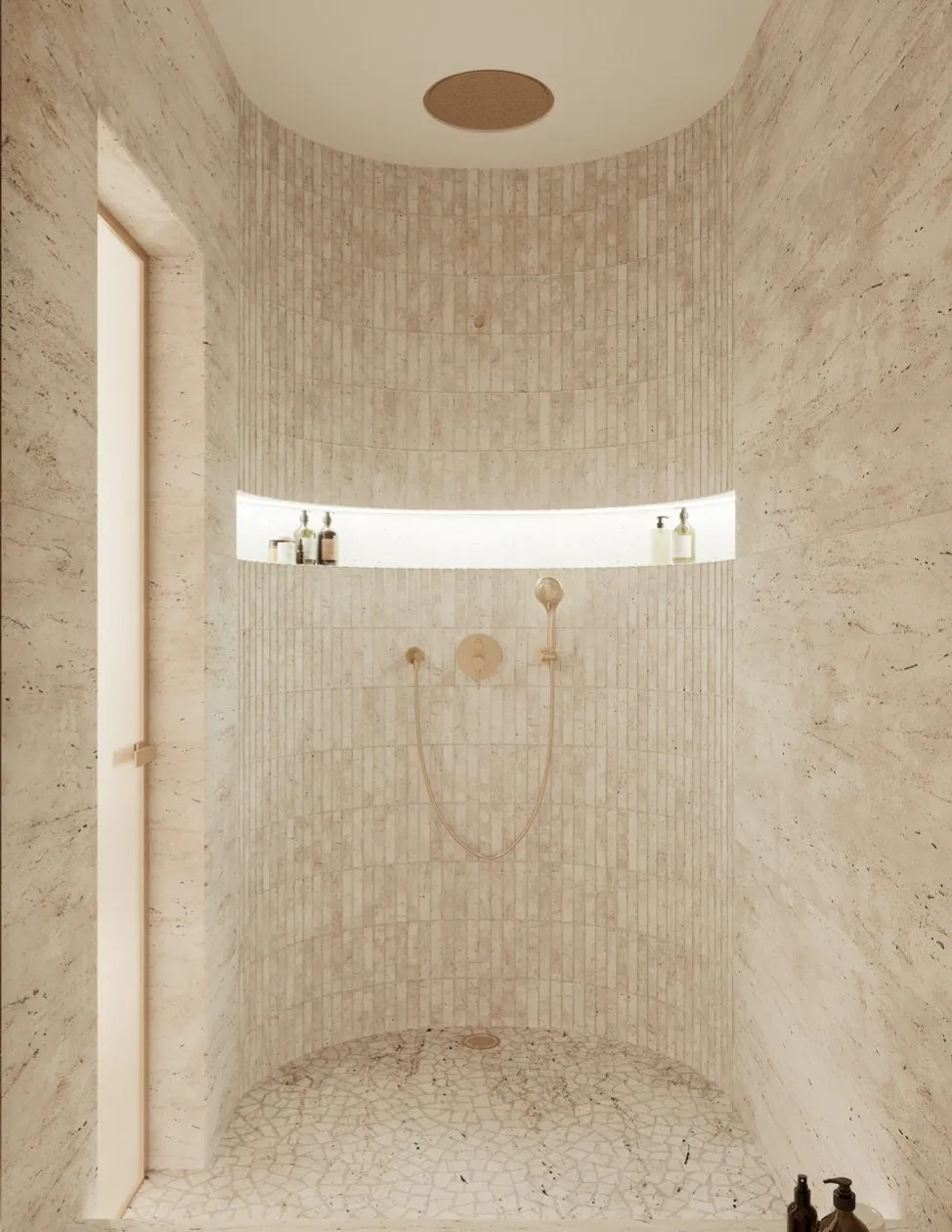 Master bathroom with dual vanities and earthy material selections
